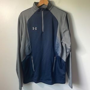 Under Armour blue/grey pullover 1/4 zip in Medium. Zippered kangaroo pocket.
